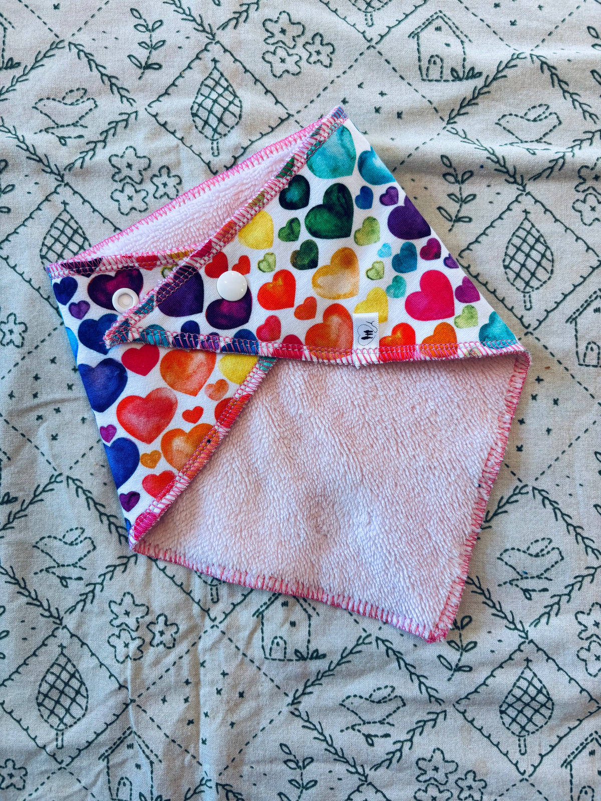 Dribble bib: Rainbow hearts